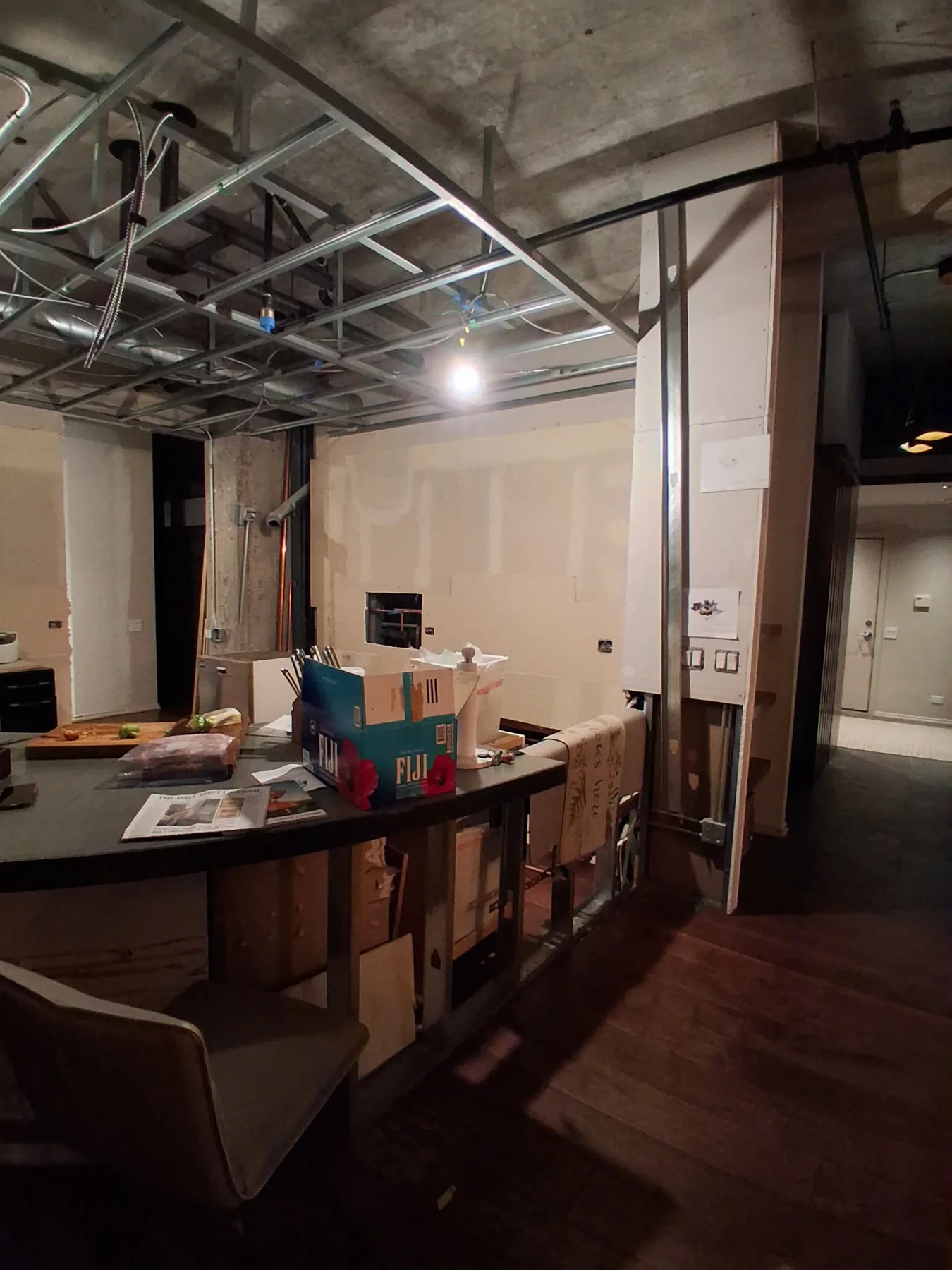 Interior renovation with suspended ceiling framing in progress